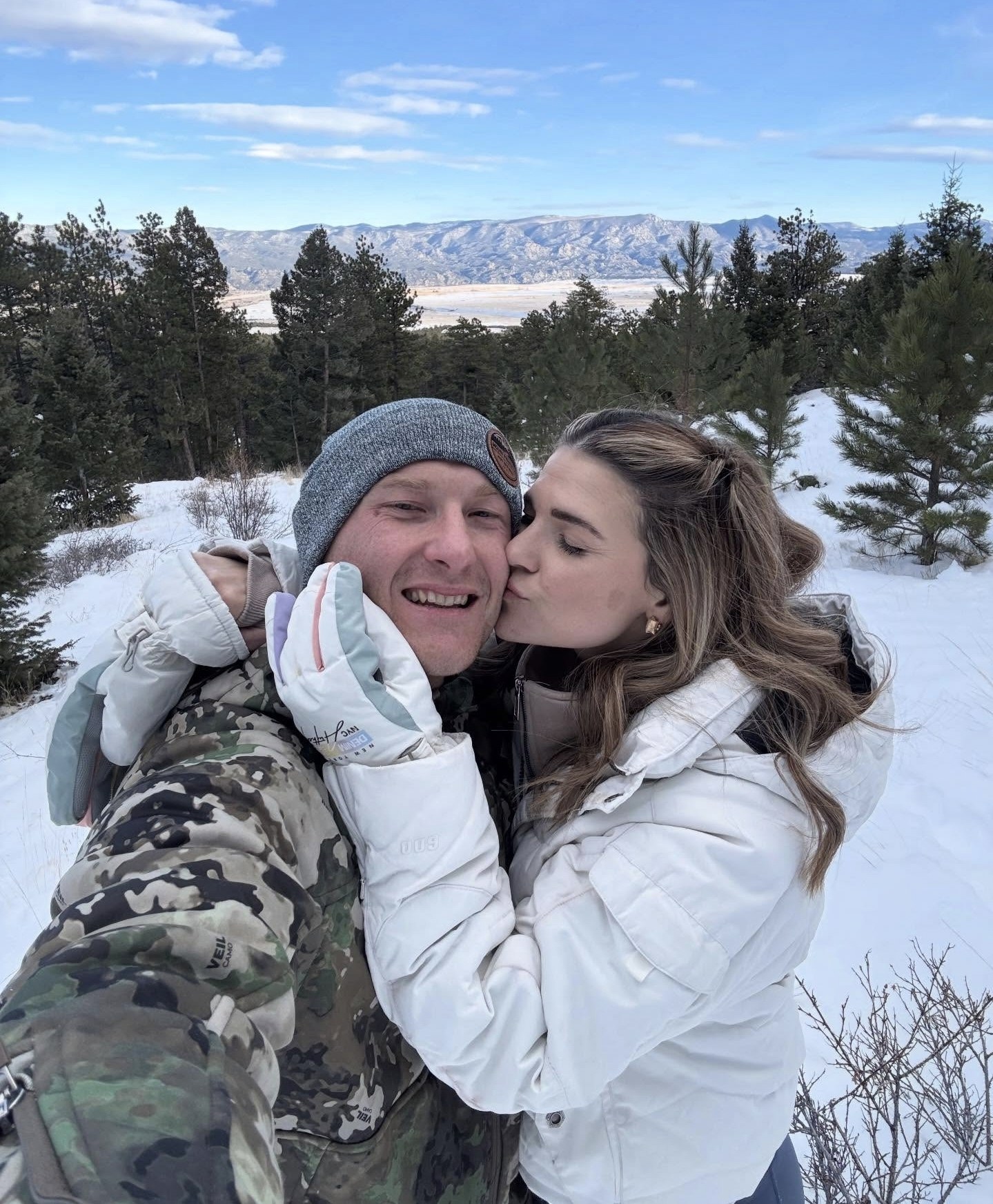 Damon and his wife in the snow